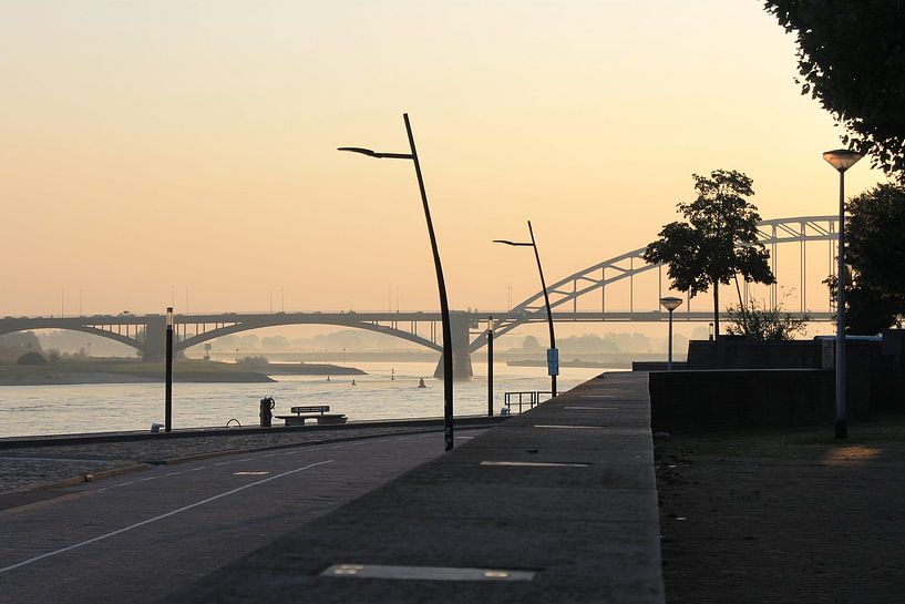Sun rise on the Waal by Charlie Moulin