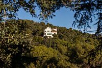 Haus an der Bergwand