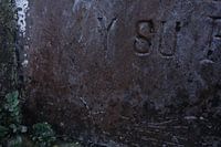 Detail eines alten Grabsteins