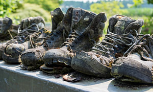 row of old leather worn out shoes 