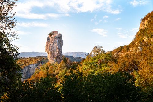 Pillar with Church in Landscape. by Roman Robroek - Photos of Abandoned Buildings