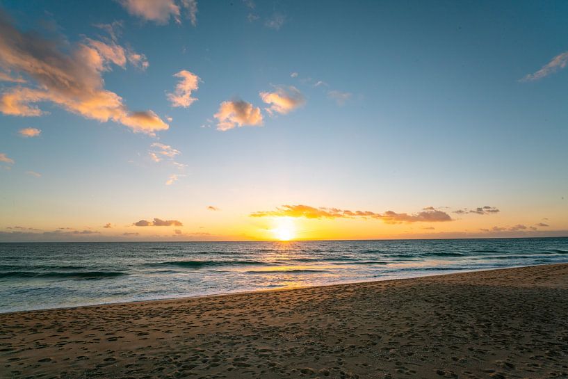 Sunset on the beach in the Algarve by Leo Schindzielorz