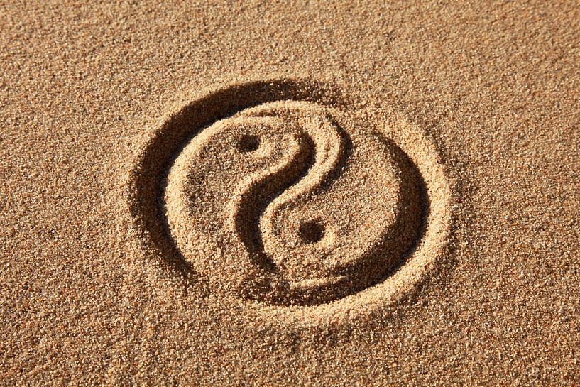 Yin and Yang in sand by Henny Hagenaars