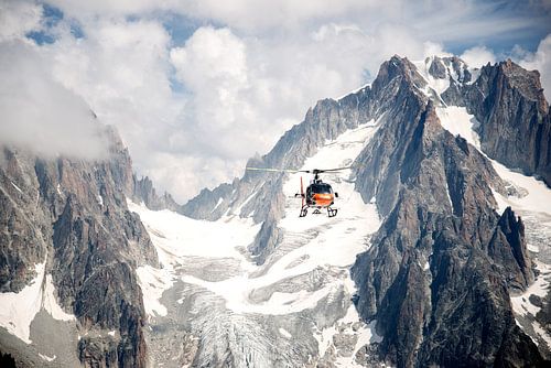 Helicopter flying over the mountains