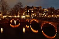 Amsterdam bij nacht van John Leeninga thumbnail