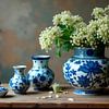 Tijdloze Elegantie: Delfts Blauwe Vazen met Bloemen van Sanne den Engelsman