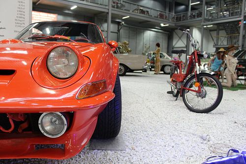 Opel GT 1900 and a moped