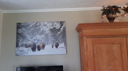 Family on the road through snowstorm