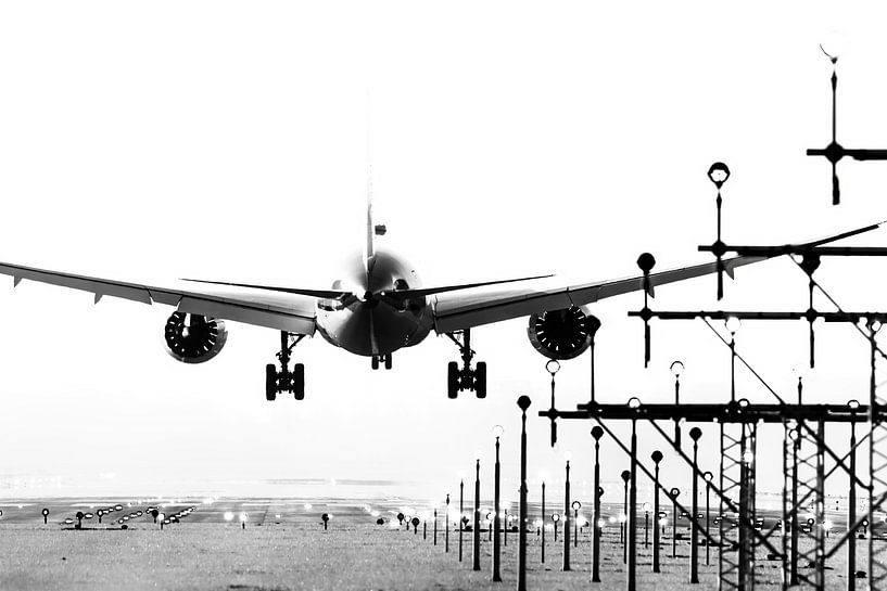 Aircraft and landing lights off the runway by Pieter van Marion