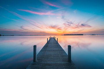 A peaceful view from the jetty on the water by tim xhofleer