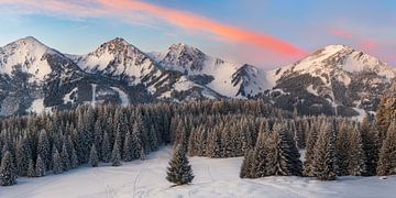 Panoramic picture of the Tannheimer Tal in winter at sunrise.