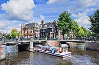 Amsterdam canal belt with a view on bridges and a tour boat  by Tony Vingerhoets thumbnail