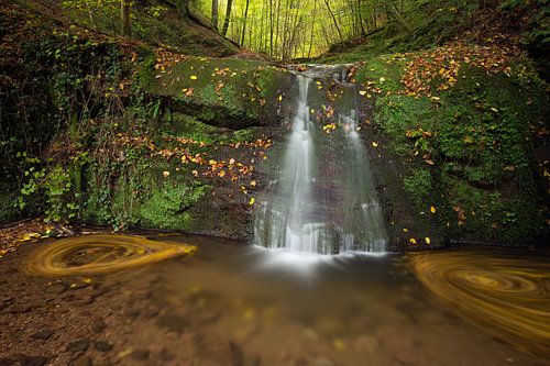 Waterfall Butzerbachtal during fall in the Eifel, Germany.