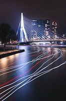 Erasmus Bridge with light trails from boats