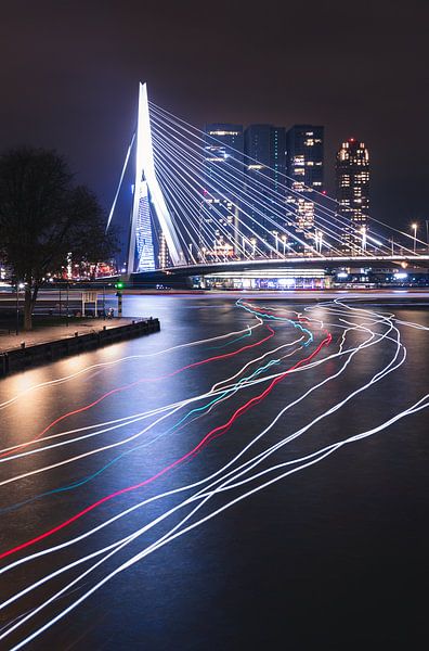 Erasmus Bridge with light trails from boats by Joey van Embden