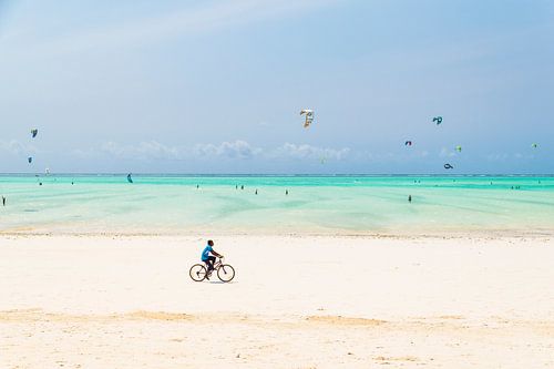 Cycling on the white beaches of Zanzibar in Africa