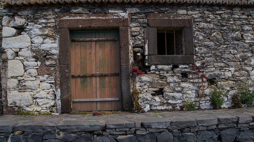 Old house made of stones in fisherman village by adventure-photos