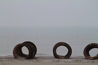Rusty metal at the misty sea