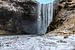Skogafoss-Wasserfall in Island von Mickéle Godderis