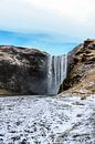 Skogafoss-Wasserfall in Island von Mickéle Godderis Miniaturansicht