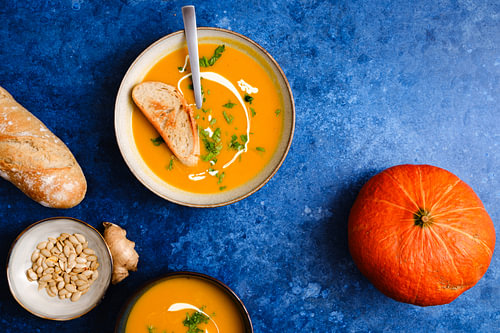 Pumpkin Soup on a Blue Table
