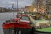 Woonboten in de Amstel van Foto Amsterdam/ Peter Bartelings