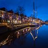Dokkum avec des bateaux illuminés dans l'eau sur KB Design & Photography (Karen Brouwer)