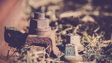 Old and lost Railroadtrack with nut and bolt  by Fotografiecor .nl