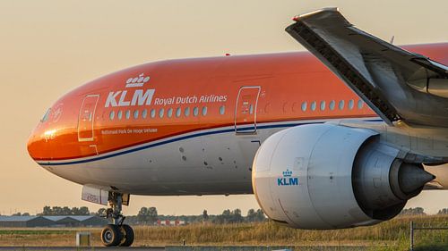 Klm 777 orange pride livery against the setting sun by Arthur Bruinen
