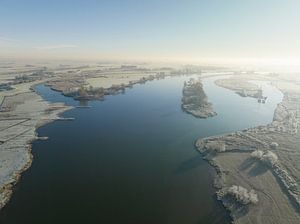 Sunrise over the river IJssel in the IJsseldelta during winter