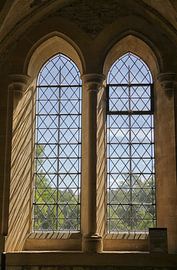 A beautiful medieval window in a medieval abbey in England by Patricia Hofmeester