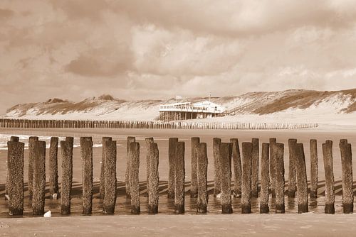 Beach pavilion with pile heads ( Zeeland ) in sepia