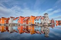 Colourful wooden pier housing by Jef Folkerts thumbnail