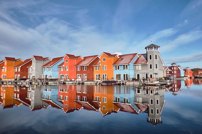Colourful wooden pier housing by Jef Folkerts