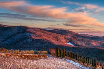 Golden Winter Sunset Over the Snowy Hills of Chianti by Stefano Orazzini