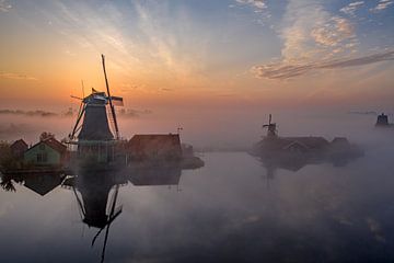 Dutch windmills in the fog at Zaanse Schans by Rene Ouwerkerk