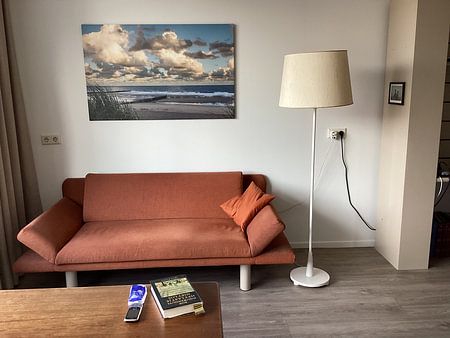 Strand van Cadzand-bad tijdens de zonsopkomst
