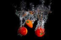 Splashing fruit, bell bell pepper and tomato