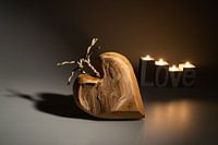 Wooden heart with candlelight
