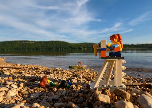 Lego figures on the pebble beach