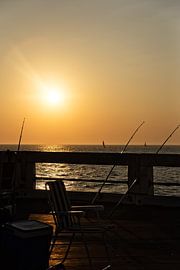 Coucher de soleil : Détendez-vous sur la jetée sur Christophe Fruyt