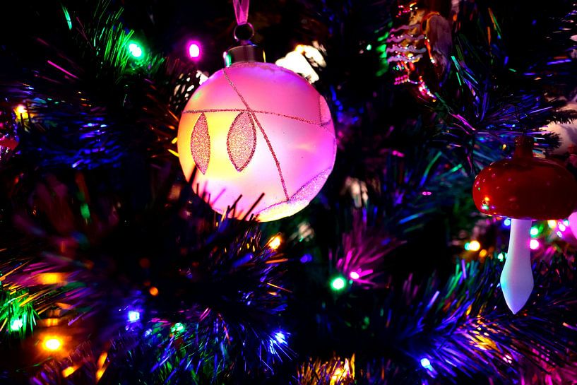 Atmospheric close-up of a shiny bauble among warm lights by Dlanor