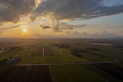 Sunset over Frisian polder landscape