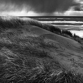 Heavy rainclouds over the Northsea by Martijn van Huffelen