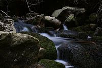 Stones where water flows past