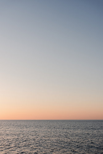 Zonsondergang aan de Italiaanse kust