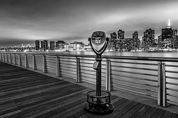 Binoculars along the East River by night in black and white
