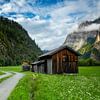 Alpine hut between the Alps in Tyrol by Ruud Engels