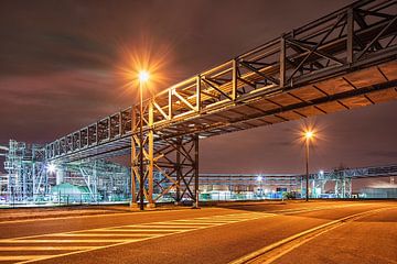Pipeline bridge crossing a road in industrial area at night, Antwerp 2 by Tony Vingerhoets