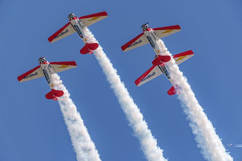 Aeroshell Aerobatic Team. by Jaap van den Berg